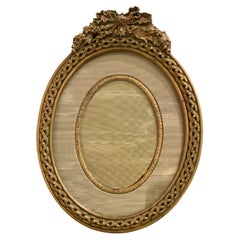 Antique French bronze dore oval shaped desk top picture frame