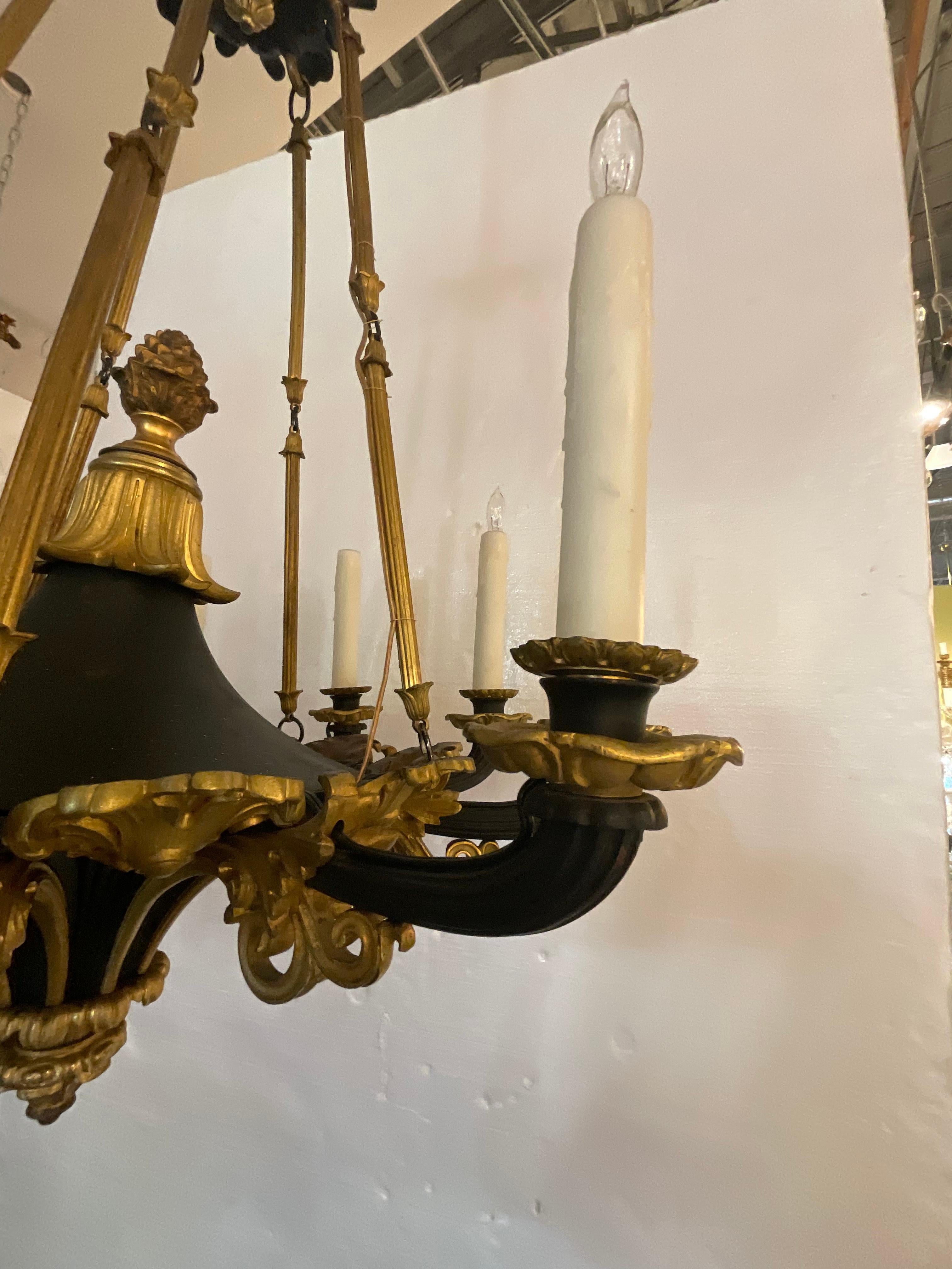 Empire Gilt Bronze Chandelier, Circa 1920’s 10 lights, with wax candle covers, US wired and certified.