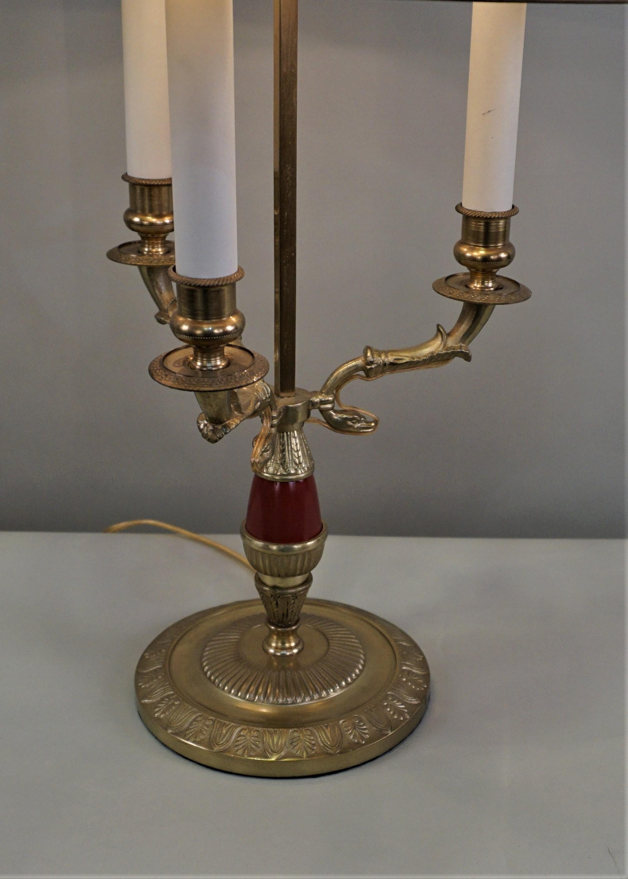 French 1930s Empire style bronze desk or table lamp with adjustable red metal shade.