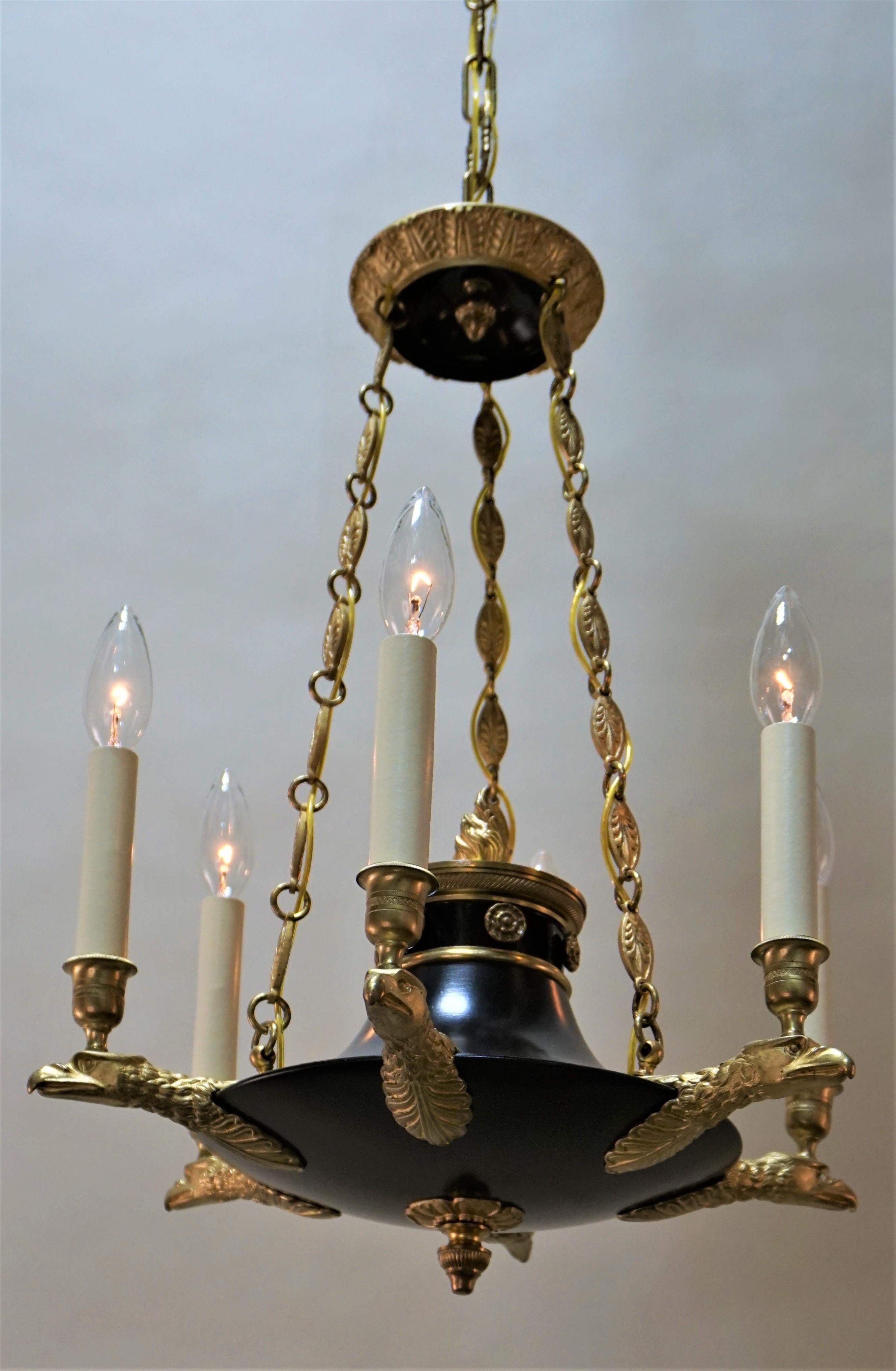 French six-light Empire style eagle head arms bronze chandelier.
Total height is 37