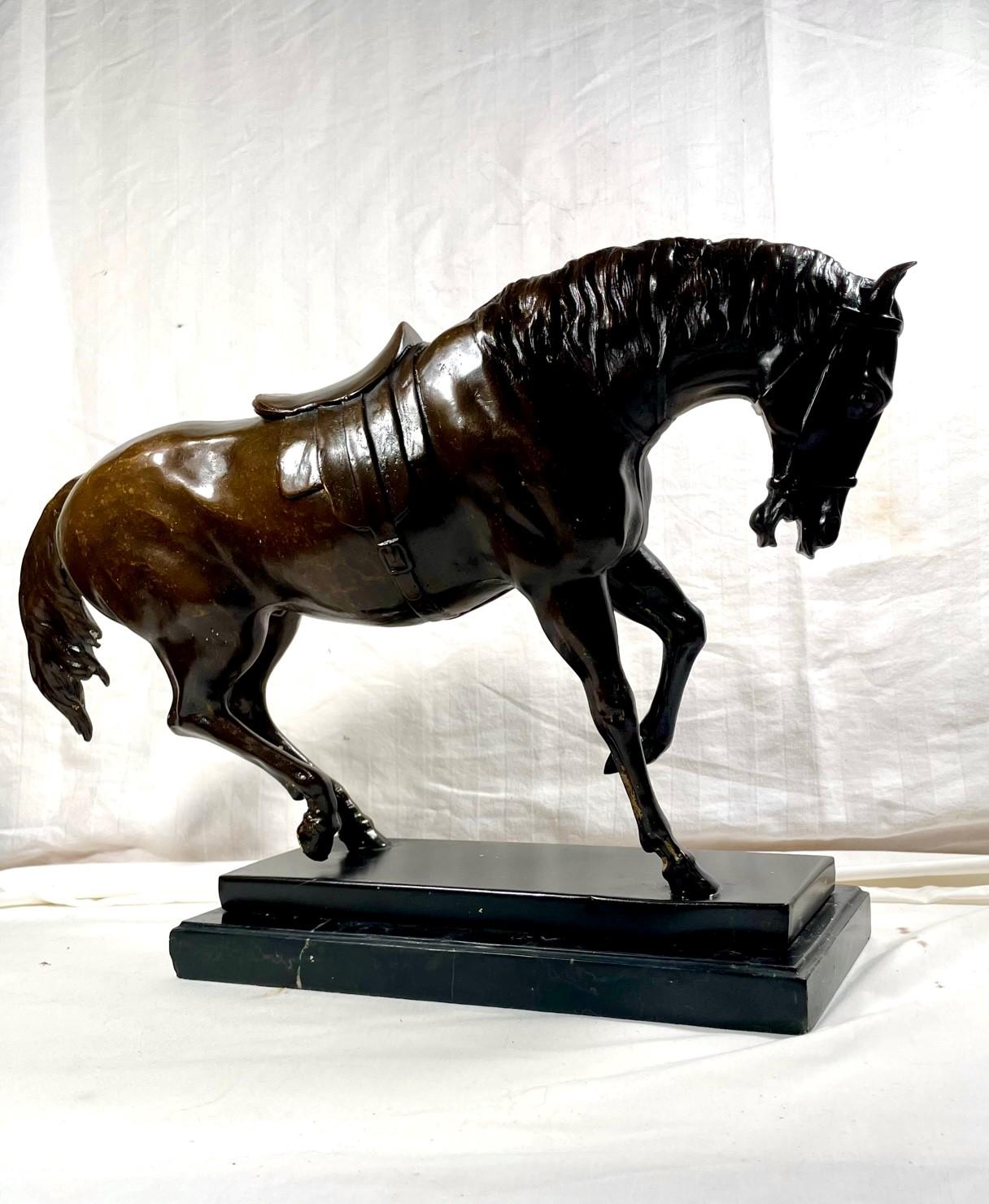 French Bronze Equine Statue after Pierre-Jules Mene.

Fabulous French animalier bronze features an elegant horse captured in an energetic pose. Bowing the head down represents its noble class with vigorous spirit and driving force. A saddle is