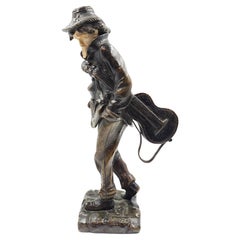 Figura francesa de bronce "Hombre con guitarra" de Rousseau