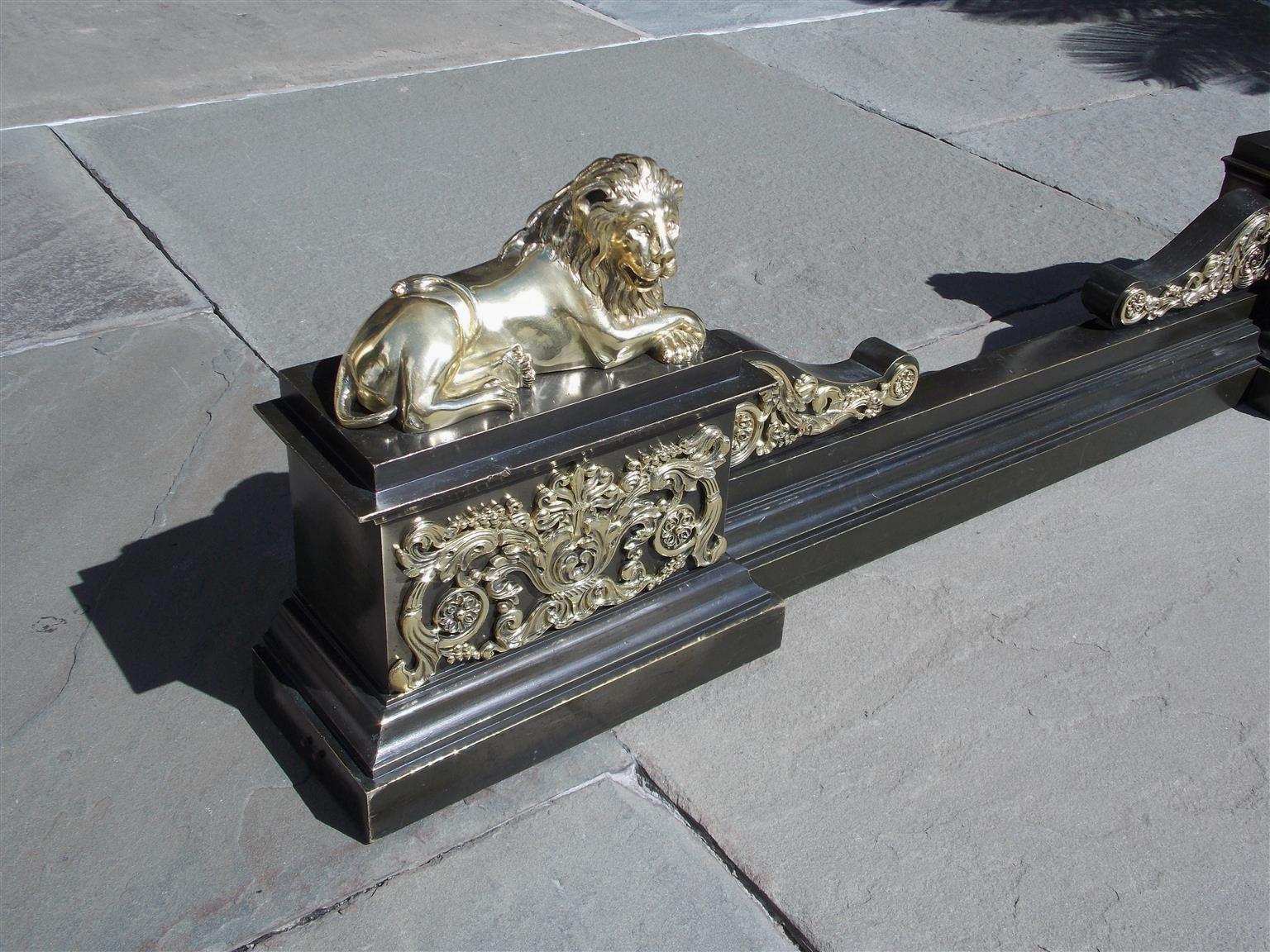 Cast French Bronze Flanking Recumbent Lion Filigree Medallion Fire Place Chenet, 1810 For Sale