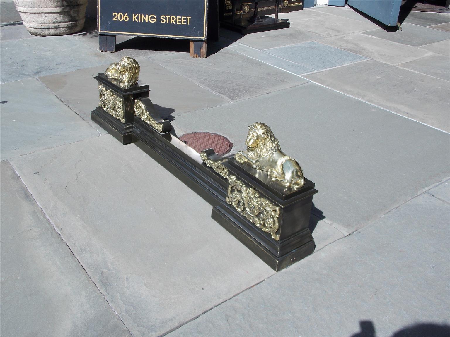French Bronze Flanking Recumbent Lion Filigree Medallion Fire Place Chenet, 1810 In Excellent Condition For Sale In Hollywood, SC