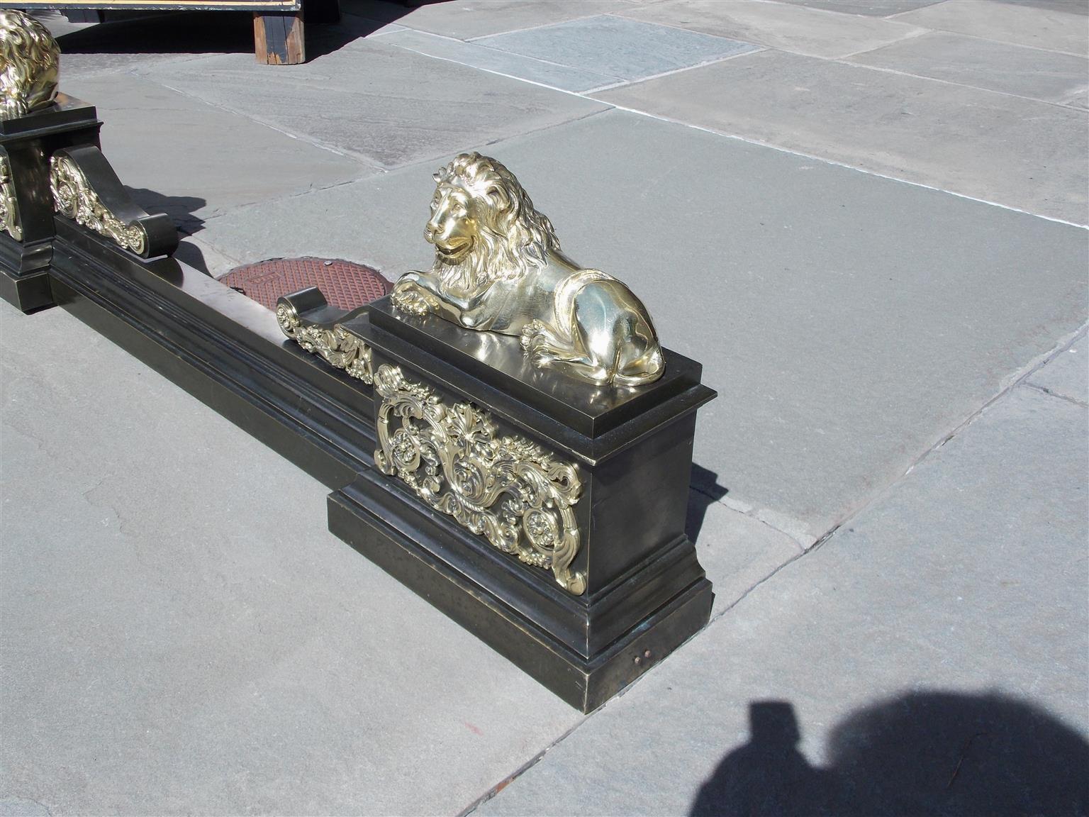 Early 19th Century French Bronze Flanking Recumbent Lion Filigree Medallion Fire Place Chenet, 1810 For Sale