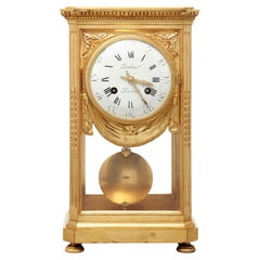French bronze 'four glass' table regulator by Robin 