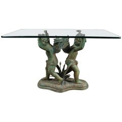 French Bronze Glass Top Garden Table with Pair of Cherubs at the River Bank