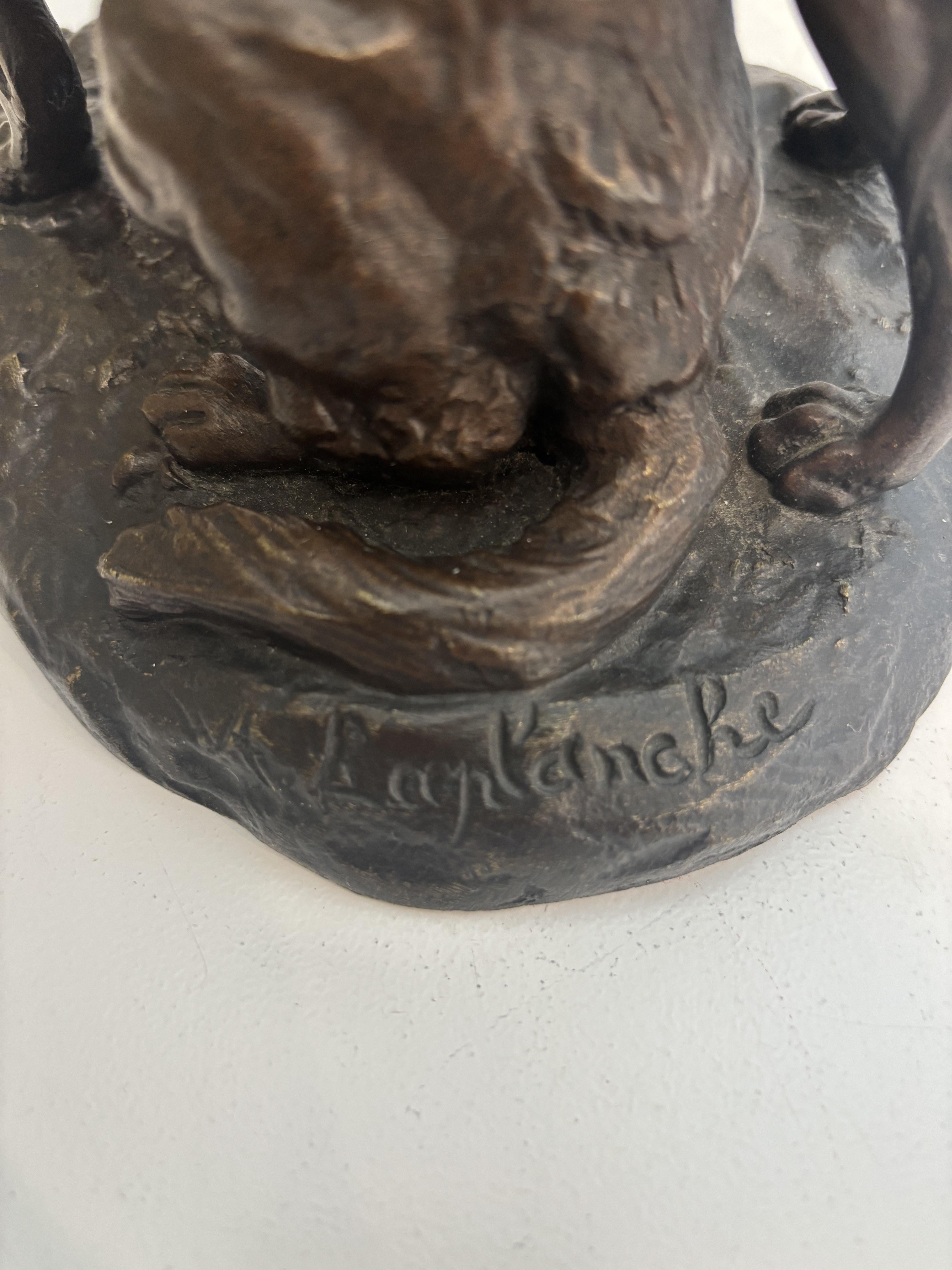 XIX secolo French bronze group of two dogs with one sitting (signed Laplanche) in vendita