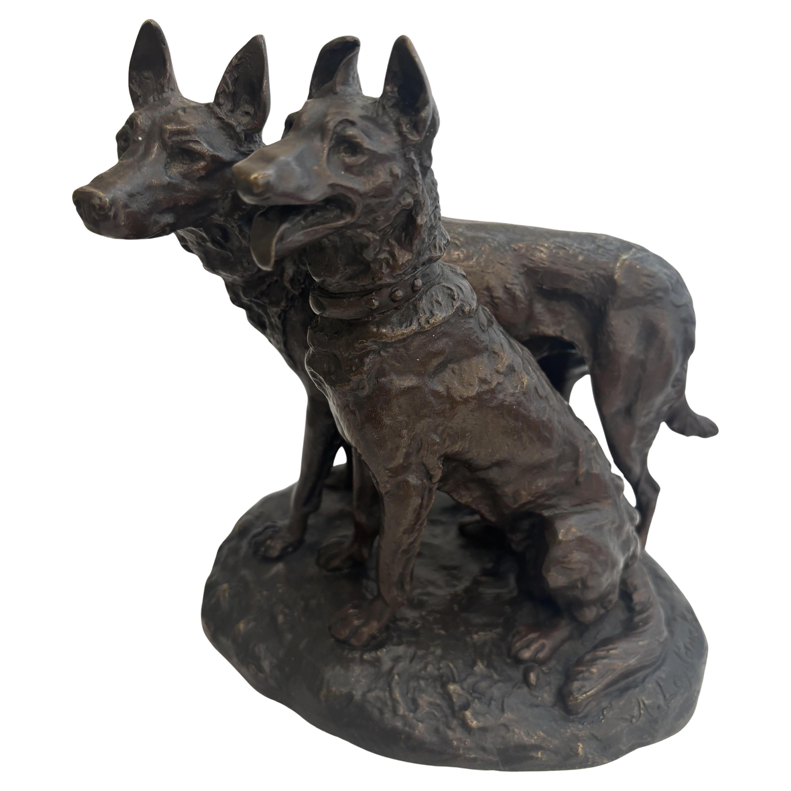 French bronze group of two dogs with one sitting (signed Laplanche)