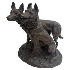 French bronze group of two dogs with one sitting (signed Laplanche)