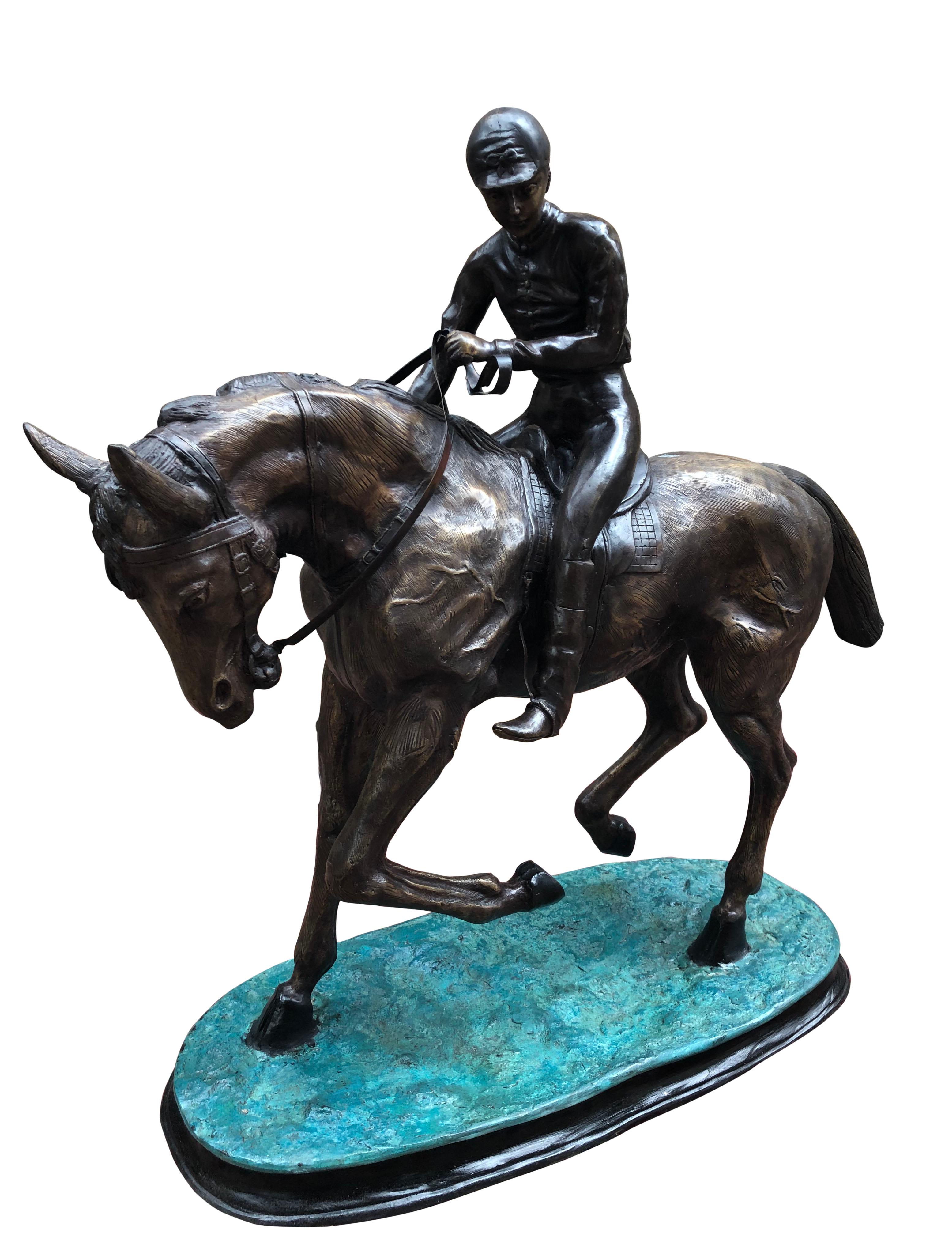 A gorgeous French bronze horse and jockey statue, made from bronze, 20th century. Believed to be a recast from the original by French artist Mene. Mene was famous for his studies of animals, particularly horses. Stands in at just under 3 feet tall