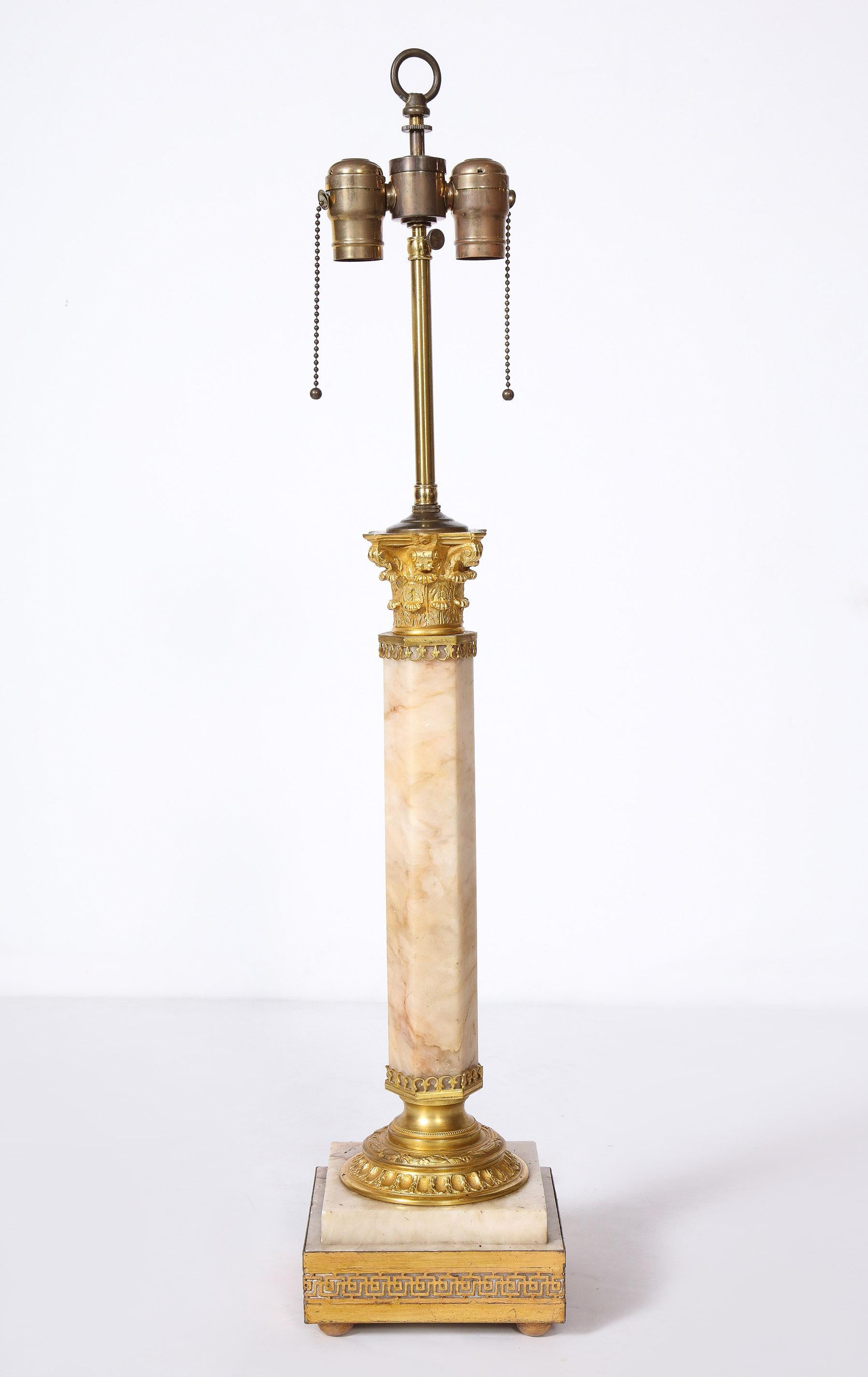 French bronze mounted marble column lamp

The octagonal column with superb quality bronze mounts on a stepped plinth with a Greek Key embossed bronze mount.