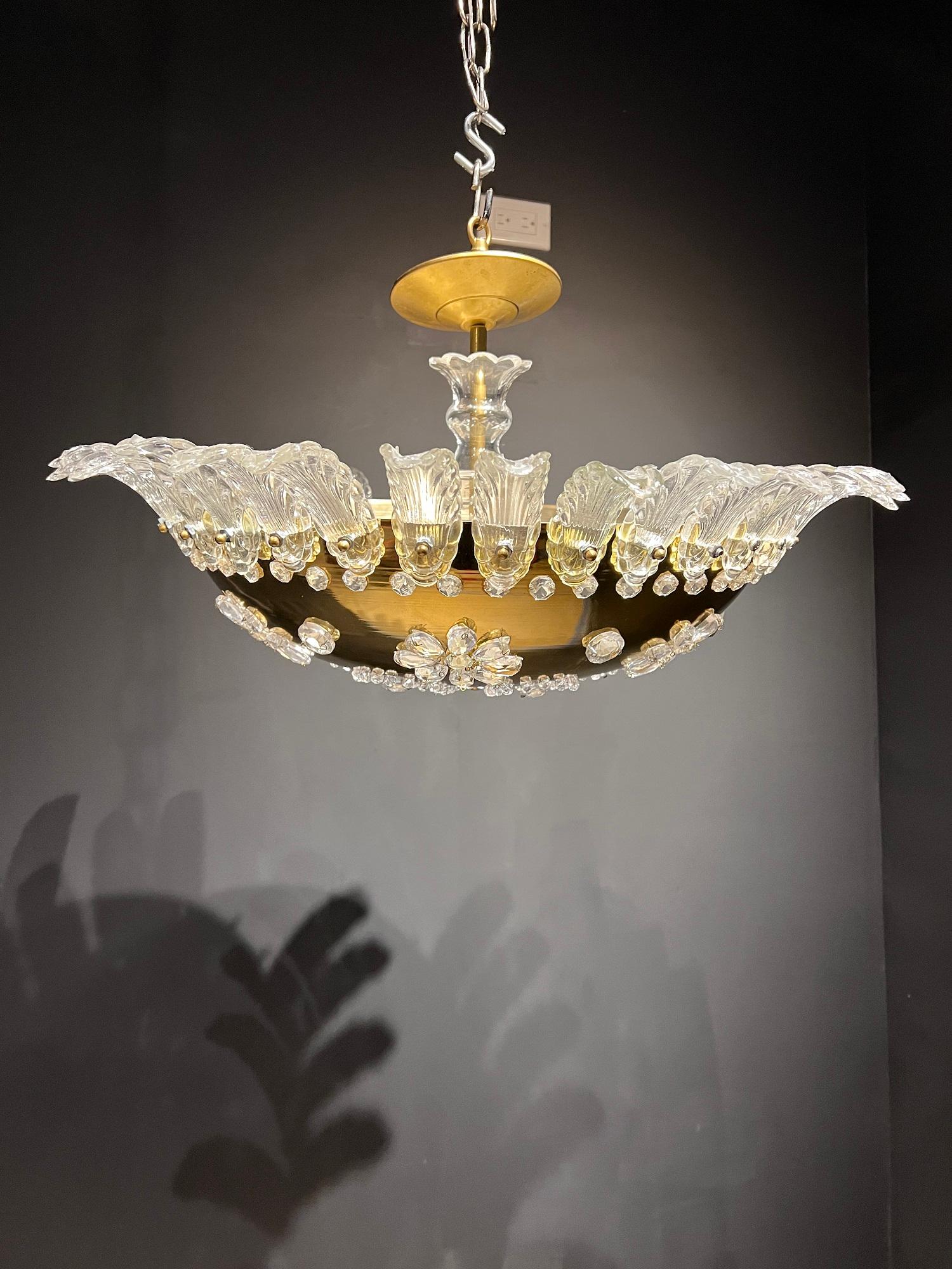 A French golden bronze light fixture with glass leaves on top and glass flowers on the body, circa 1930s. In very good vintage condition.

Dealer: G302YP
