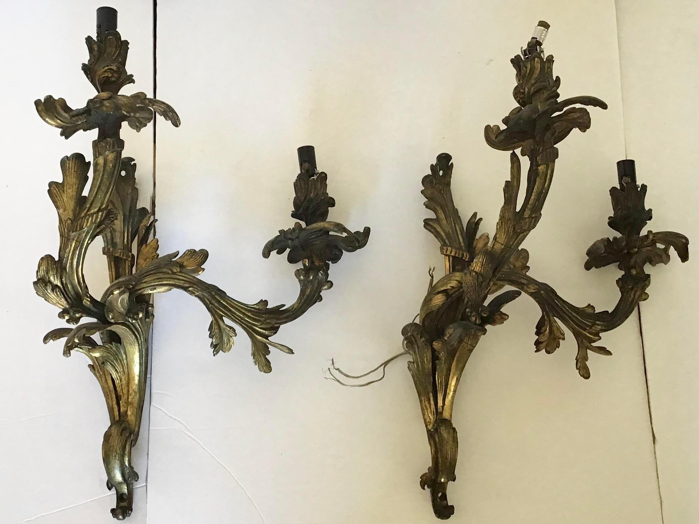 Super Elegant French pair of heavy bronze wall sconces to be wired and installed by your electrician. Very Rare Mohave matched pair of solid Bronze Fixture of this age.