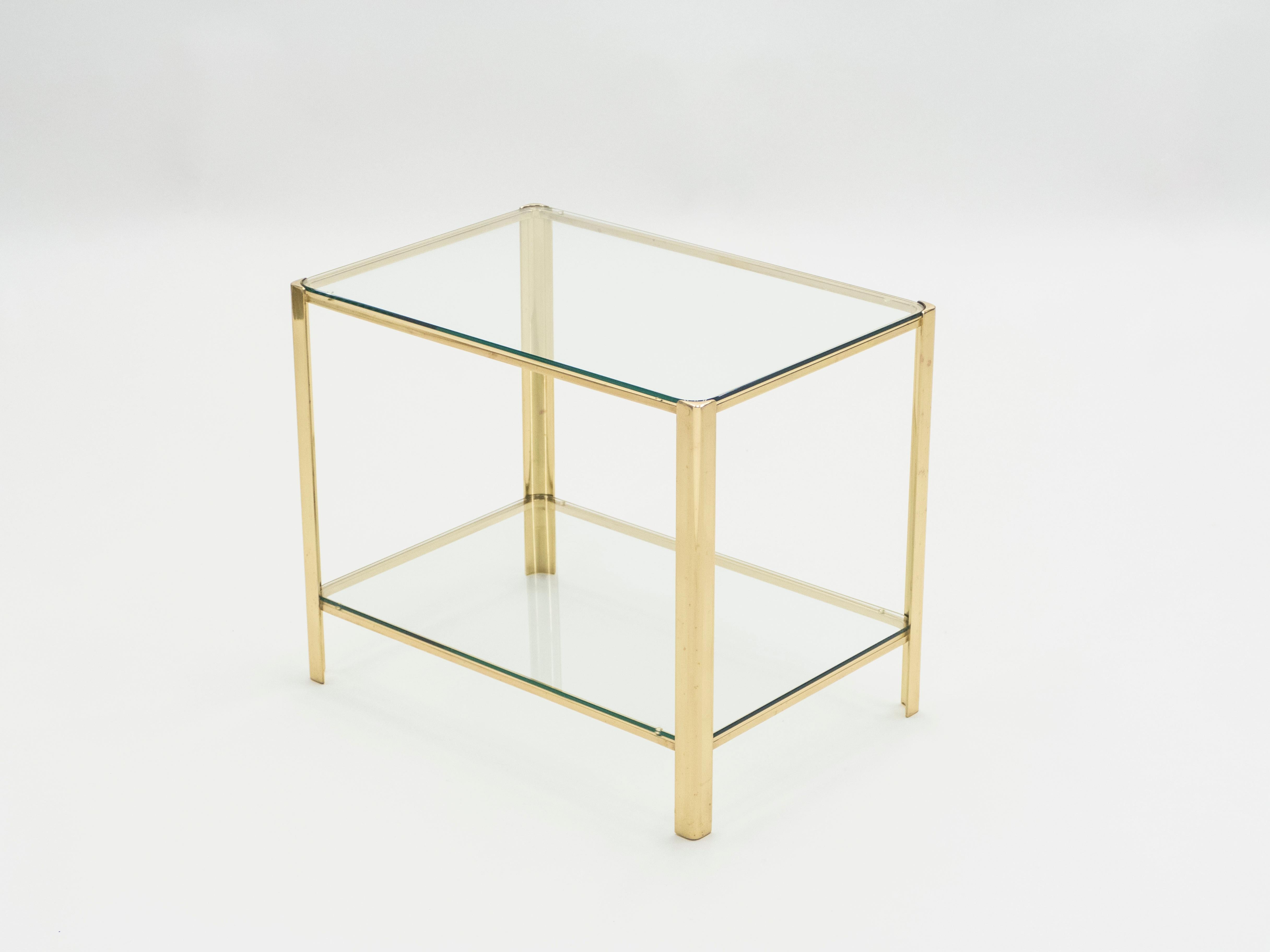This occasional and side table signed by Jacques Quinet and stamped by Broncz, is a remarkable find. It features a strong, bronze base constructed to last. The 2/3 glass top adds extra storage space as well as aesthetic appeal. This end table will
