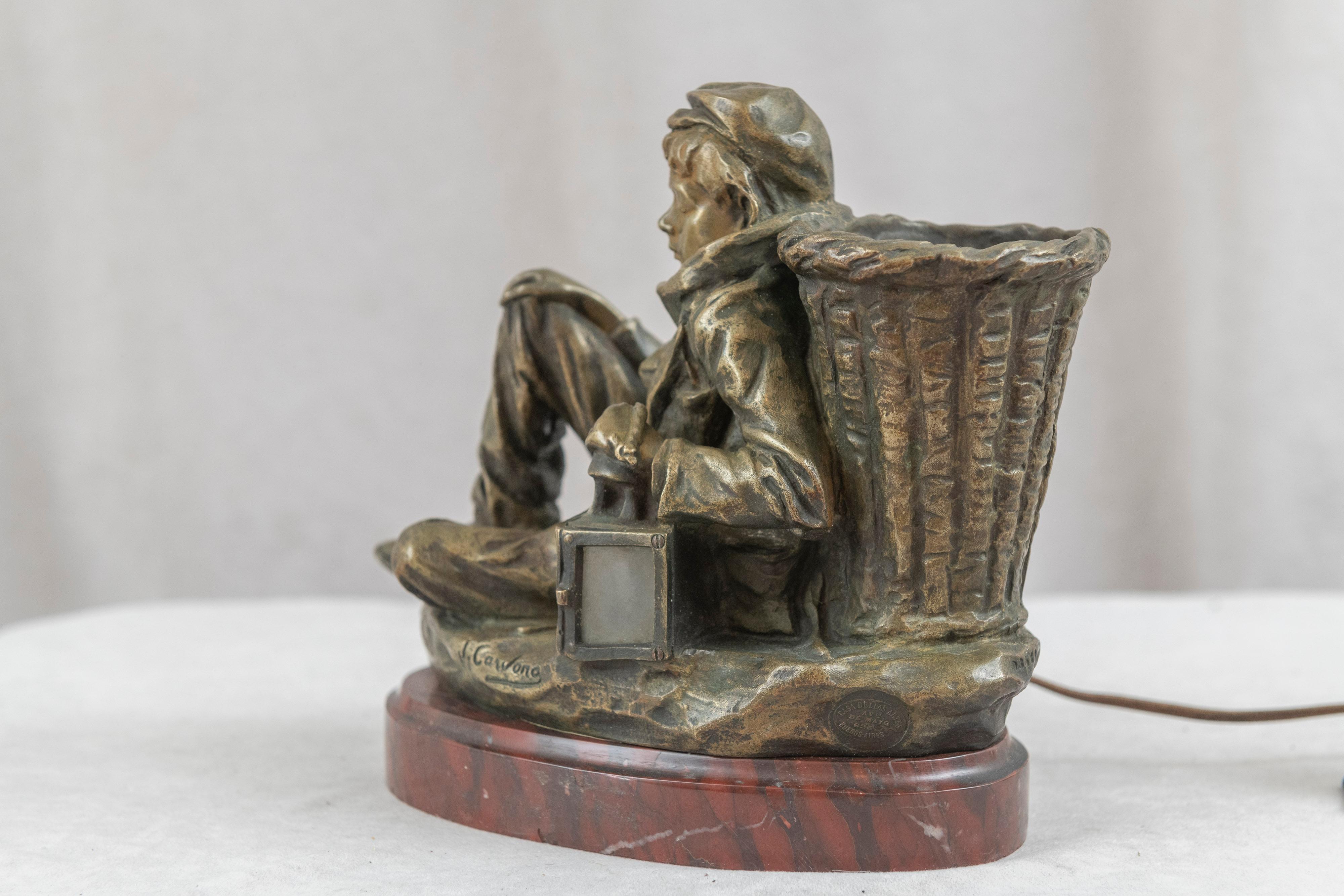Early 20th Century French Bronze of a Seated Boy w/ Lit Lantern, Signed J. Cardona '1878-1923' For Sale