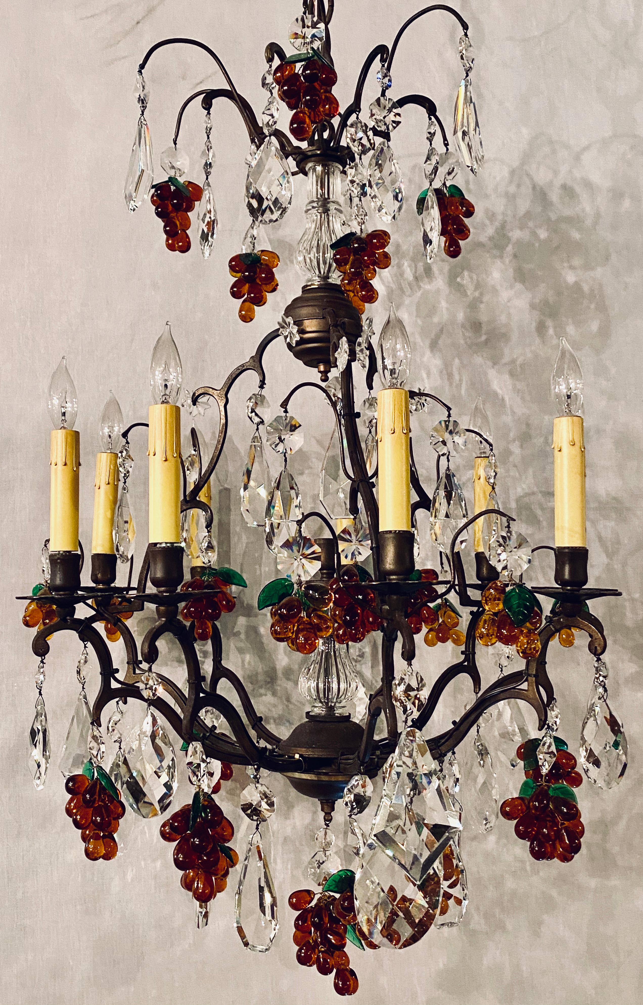 French bronze patina 9-light chandelier cut crystal & glass fruit decorations. This is simply a fine and fun chandelier. The whole in a bronze patinated frame having nine lighted arms and full cut class crystals along with many glass fruit