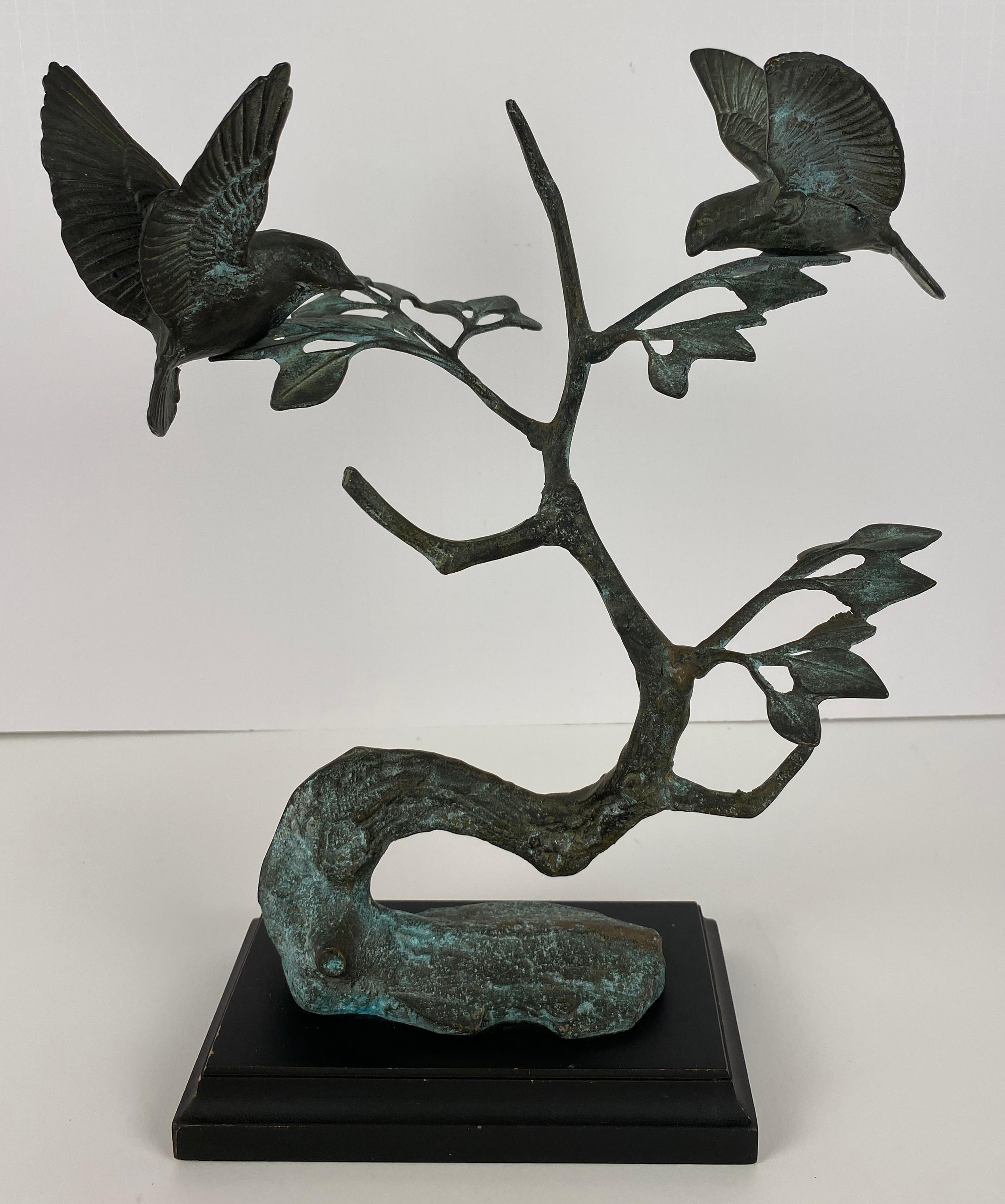 French Bronze Sculpture Birds Perched on Branch
Bronze bird sculpture with a patinated finish.  

Measures: 12 1/2