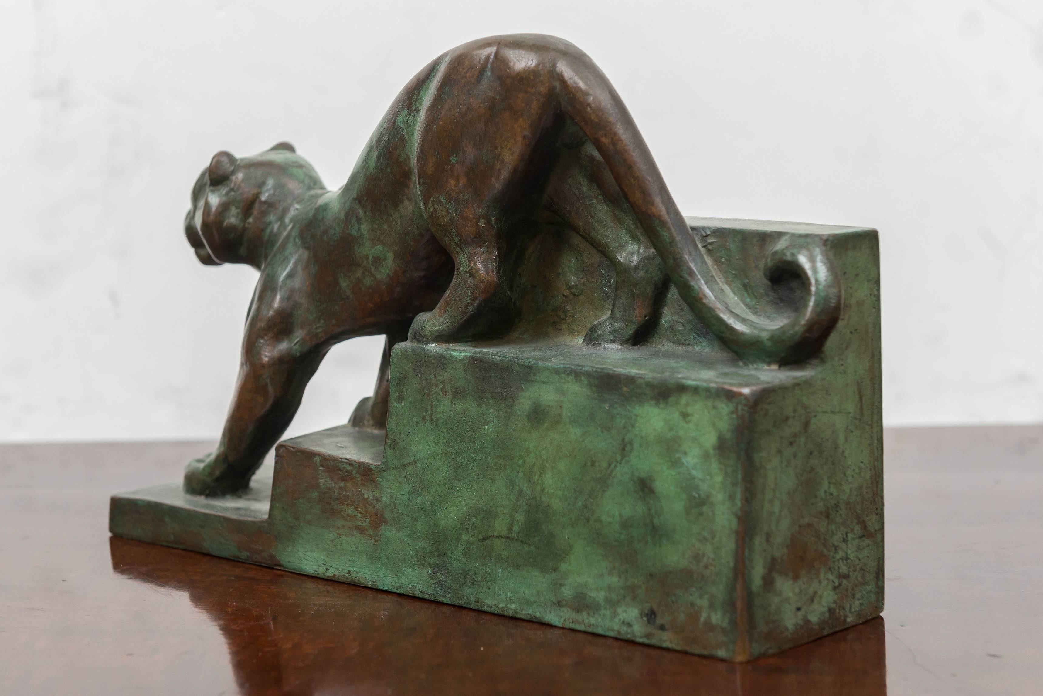 French bronze sculpture of a jaguar by J. Andr'e, Paris, circa 1925
Retains the old worn, partial verdigris and warm bronze surface patina.
A bold depiction of a Jaguar descending a stepped base. Stylized expressionist, Art Deco powerful lines and