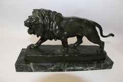 French Bronze Sculpture of a Powerful Hunting Lion, Signed Vidal, circa 1900