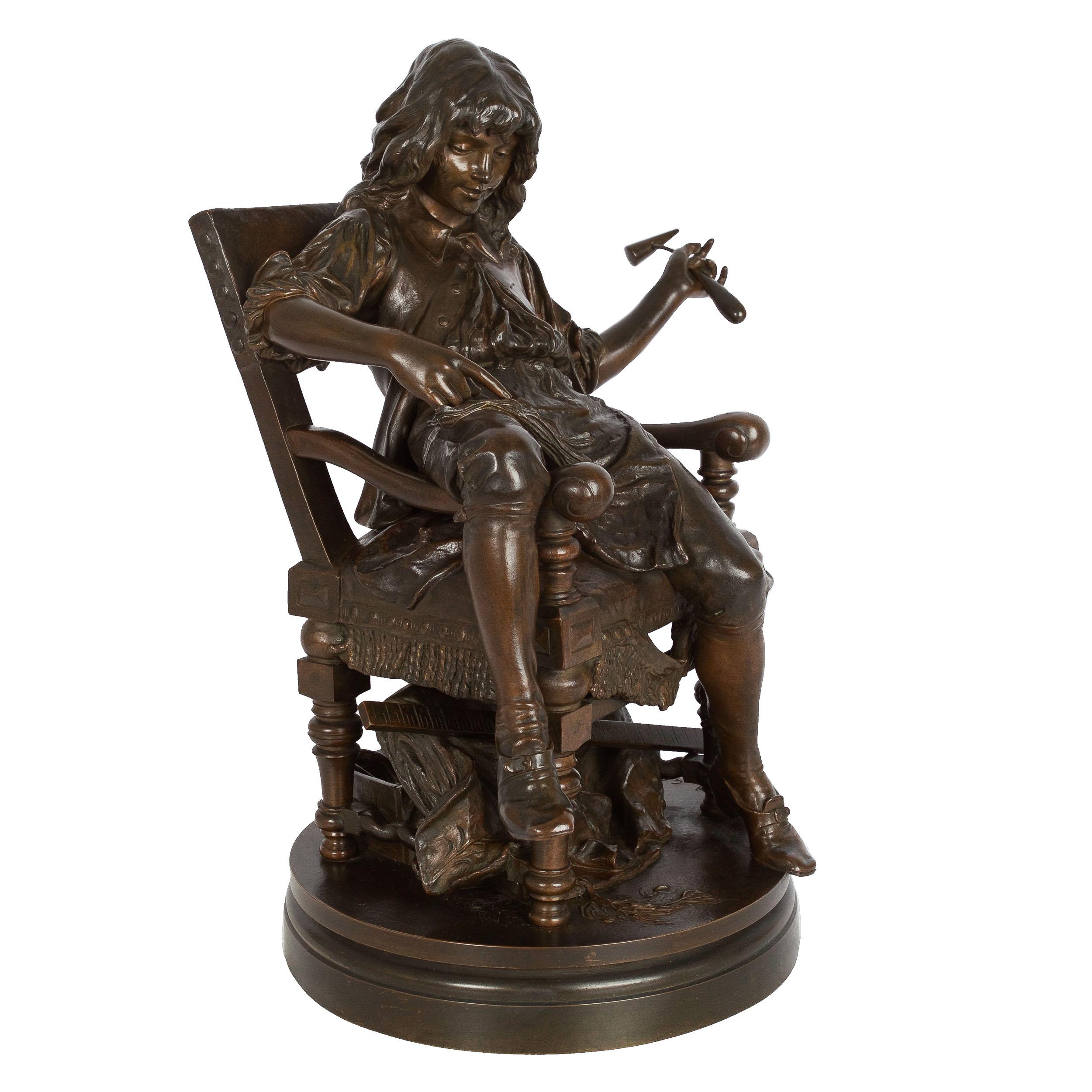 A finely cast model of Jean-Baptiste Poquelin (French, 1622-1673), known as Molière, it is a wonderful historical study that captures the playwright and actor as a carefree youth. Reclined in a worn out chair, and judging by the worn out covering