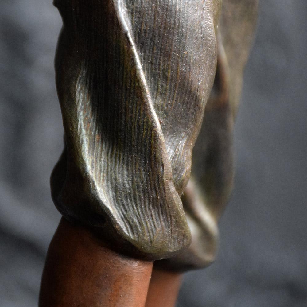 whistling boy statue