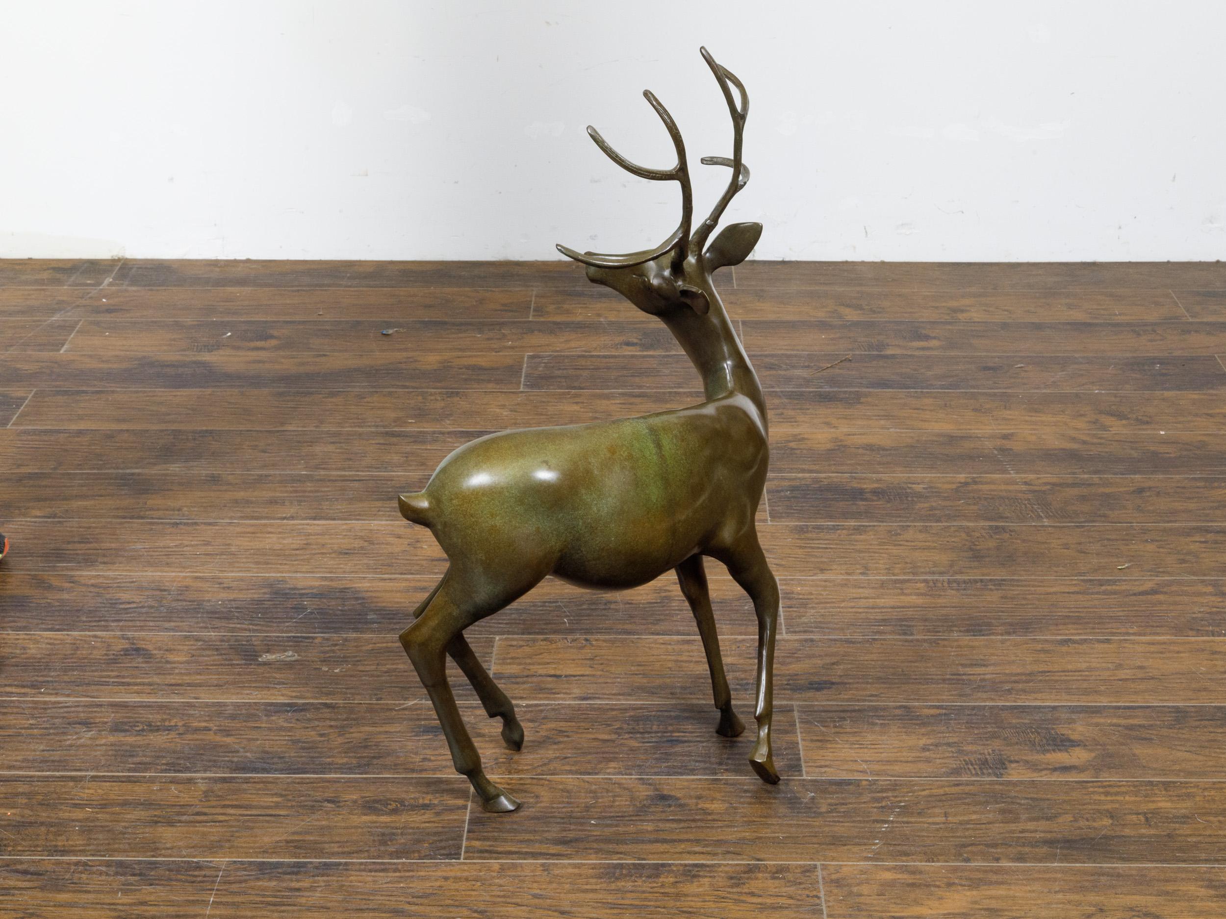 French Bronze Stag Sculpture with Large Antlers and Brownish Green Color For Sale 1