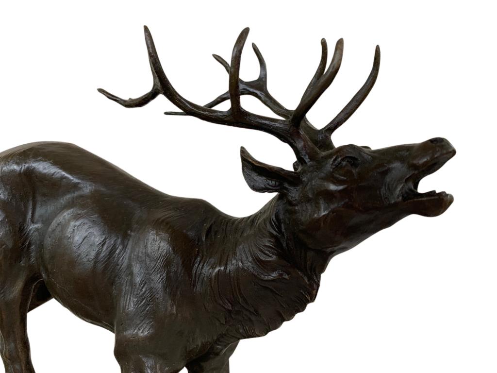 Stunning French bronze casting of a stag on a small rocky outcrop. Exquisite piece signed on the base, 'P. Le courtier'. Artist has really caught the beauty and elegance of the creature. Patina is superb and stands on the black marble base. Offered