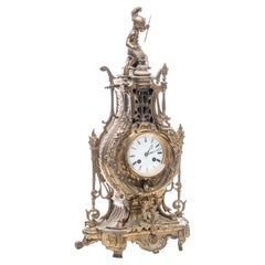 Orologio da camino alto in bronzo francese a forma di lira sormontato da una figura di Cupido