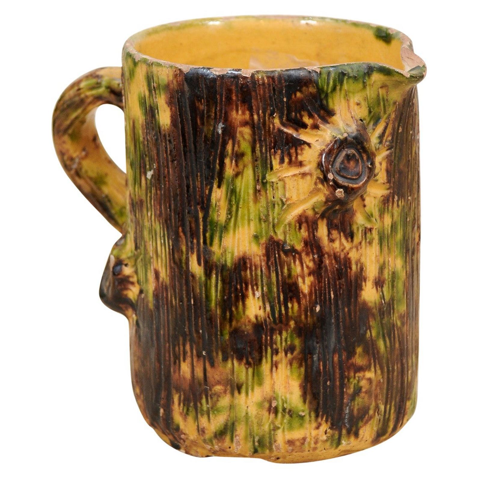 French Brown Glazed Pottery Pitcher with Yellow and Green Textured Accents