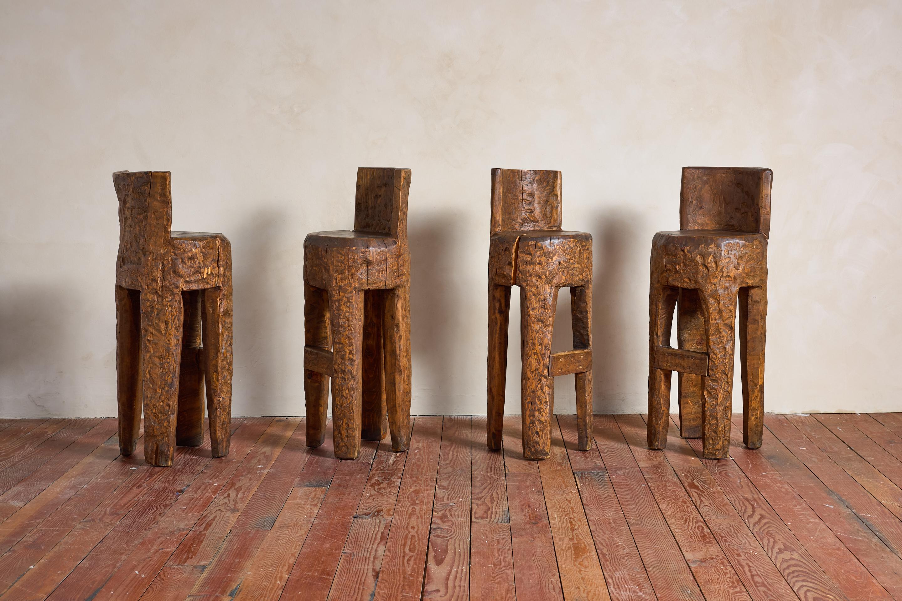 Unique set of 4 primitive brutalist barstools - France, 1940's

Carved from a single tree - 

Hand carved walnut wood with curved back, thick seats 

Taller than regular bar height but can be cut down upon request. 

Unique and Wabi Sabi design -