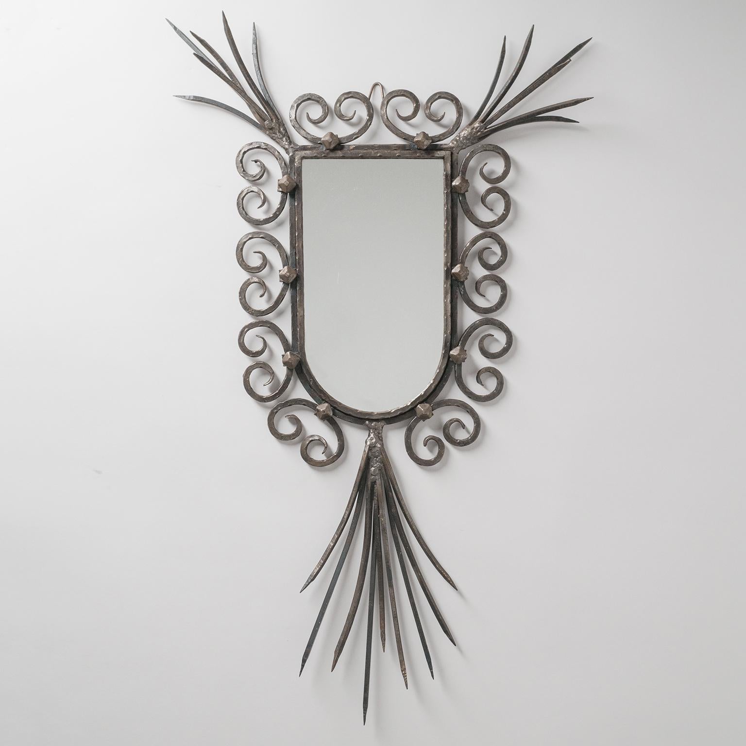 Rare French Brutalist mirror from the 1960-1970s. Very unusual sculptural design combining classical elements with expressive 'rawness'. Mirror area is 31 x 17cm or 12 x 7inches.