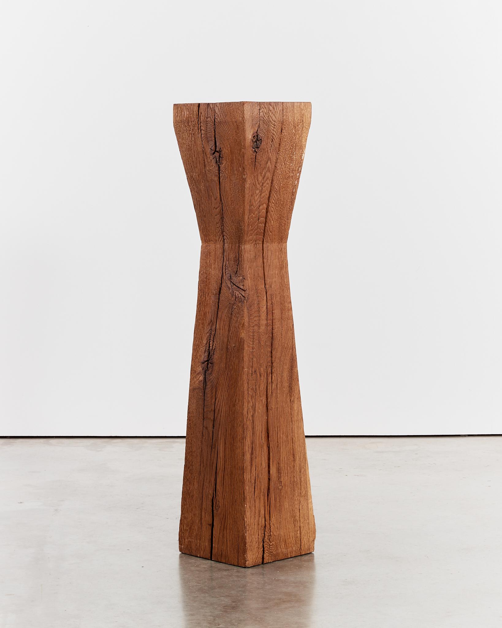 Sourced from the South of France, this brutalist pinched waist plinths is reminiscent of Brancusi's signature form, made from heavy solid oak.
Signs of wear in keeping with age.