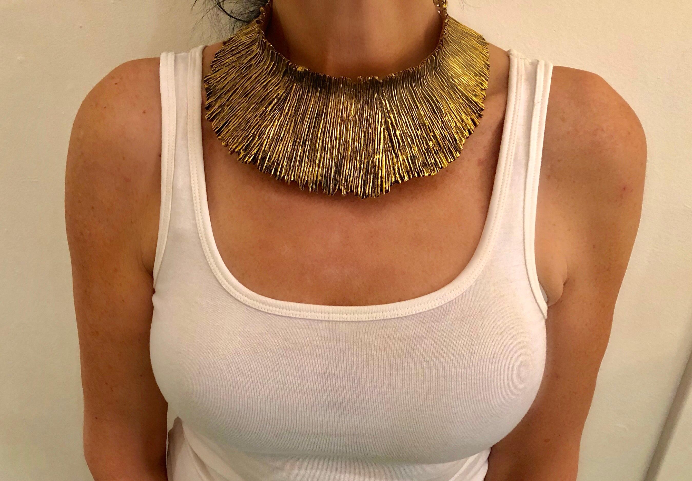 Vintage circa 1980's French brutalist/contemporary style gilt textured statement necklace by Biche de Bere Paris. The architectural collar is comprised of sculpted matte gold-tone metal with a patinaed textured pattern - signed Biche de Bere on the