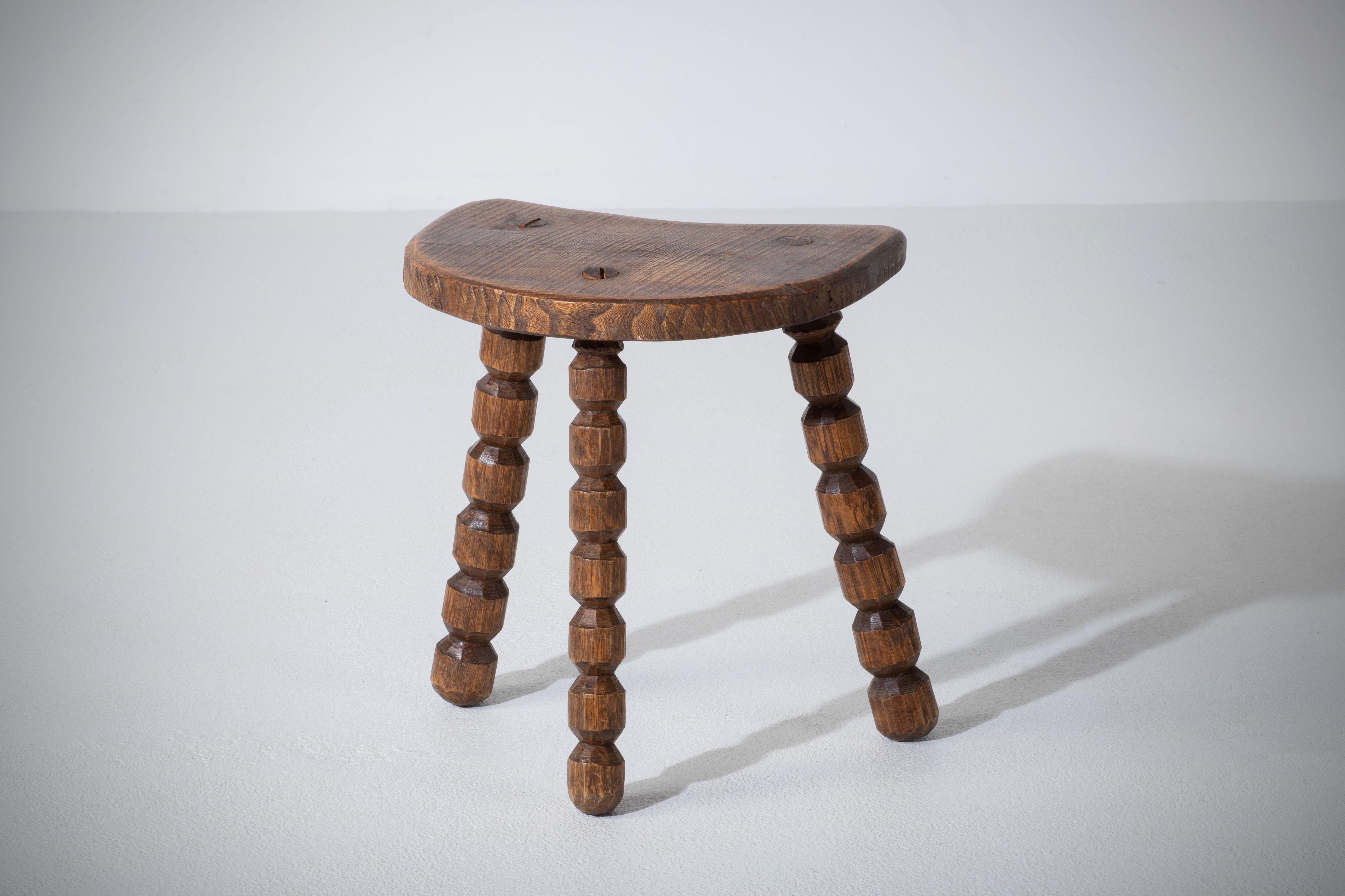 Distinctive wood midcentury stool from France. Made in the 1950s, with no hardware. Lovely primitive look with gouge work.
Good vintage condition.