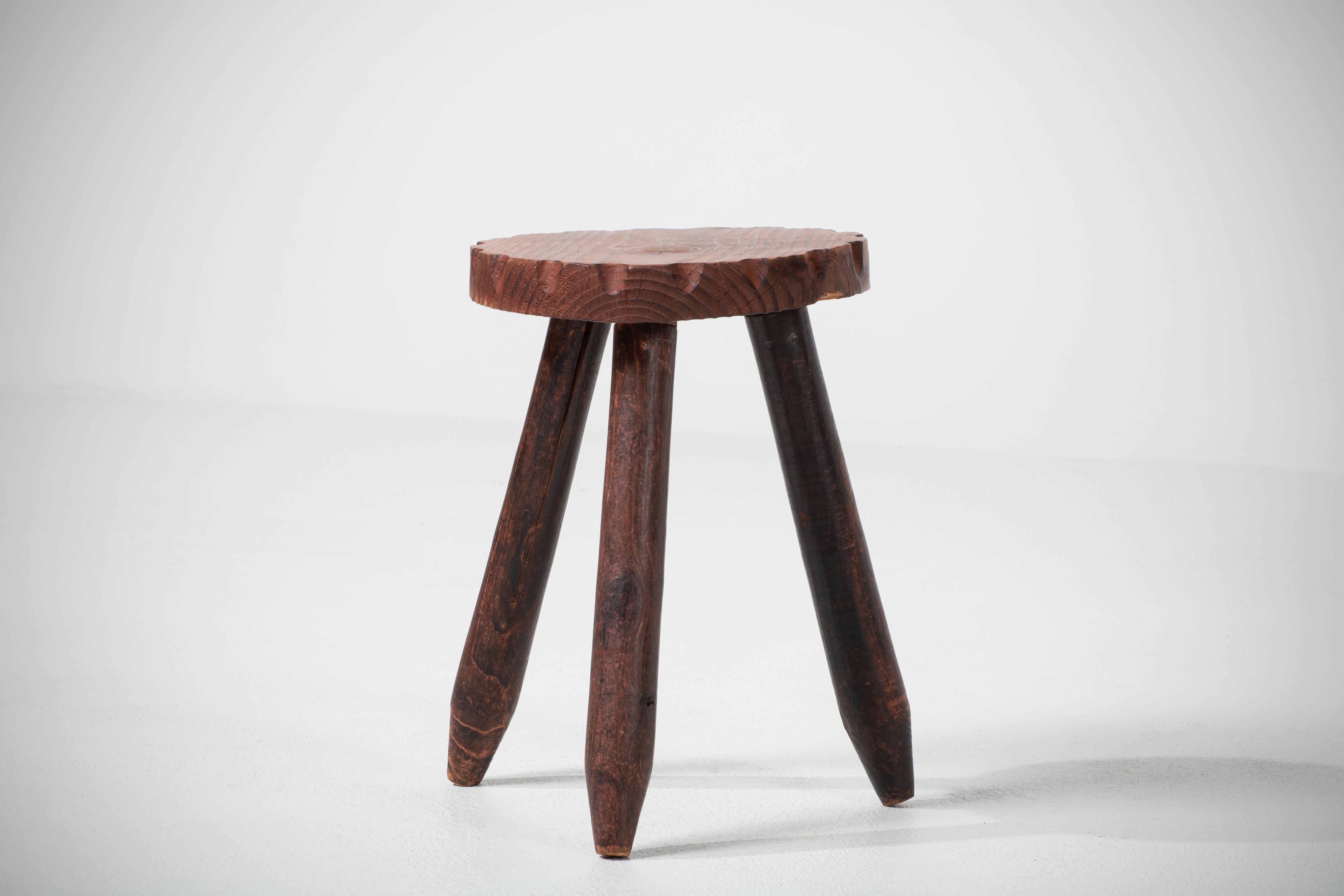 Fantastic wood stool from France in the style of Charlotte Perriand. Made in the 1960s with three legs. No hardware. Good vintage condition.
 