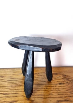 French Brutalist Tripod Stool, Hand-Carved Ebonized Wood, circa 1950–1960.