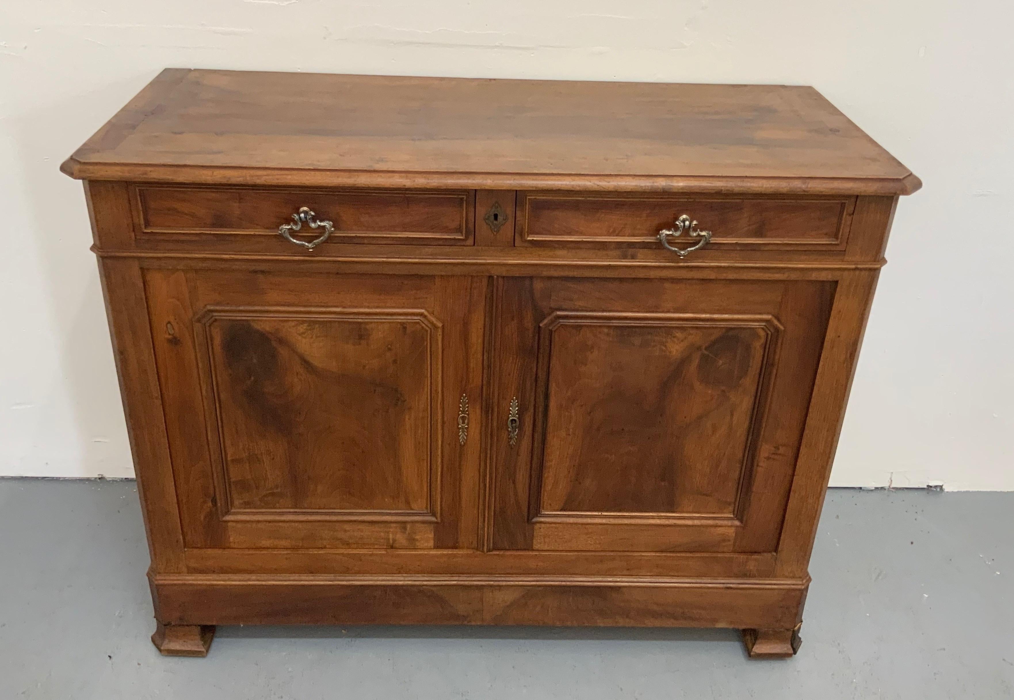 French buffet Louis Philippe made in walnut burnt wood and varnished with 2 doors and 2 drawers from 20th.