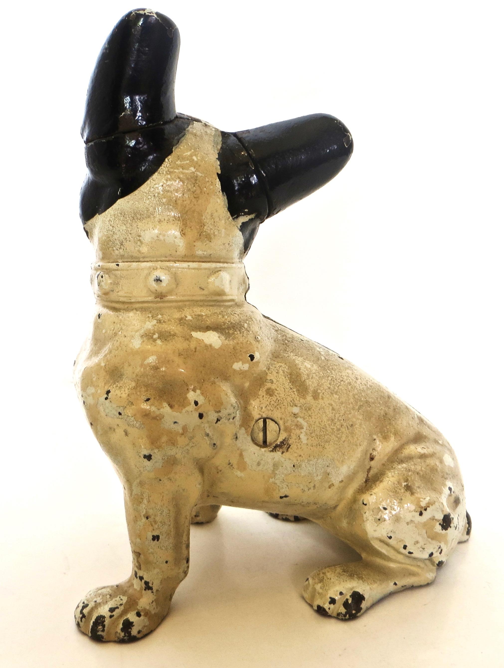 This full figured cast iron, hand painted doorstop, is known as 