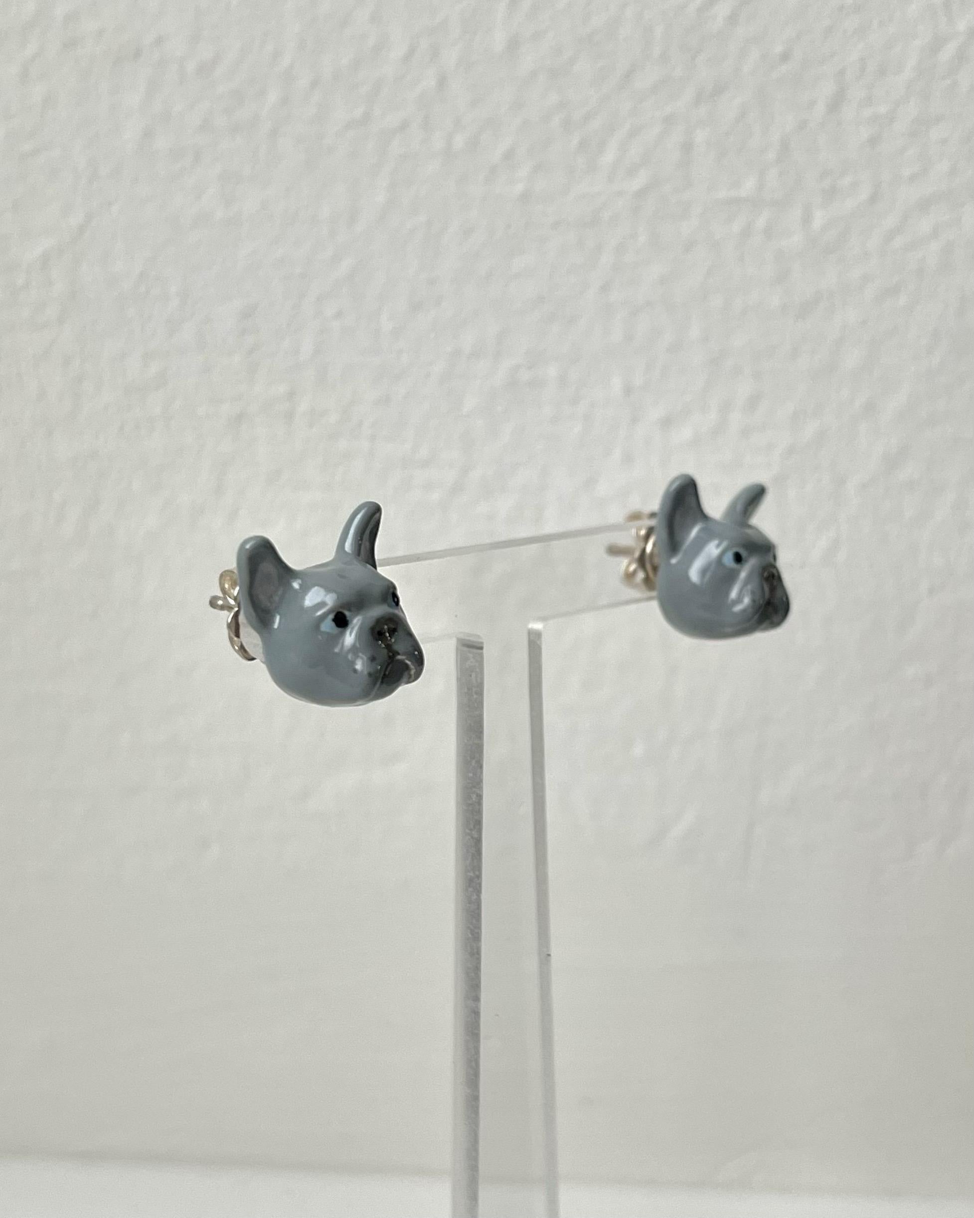 Earrings made in sterling silver 925, totally hand made and hand painted. 
These earrings feature a French bulldog dog with fur grey  and light blue eyes and thanks to amazing hand enamel life-like features is vividly rendered.   

Its possible to