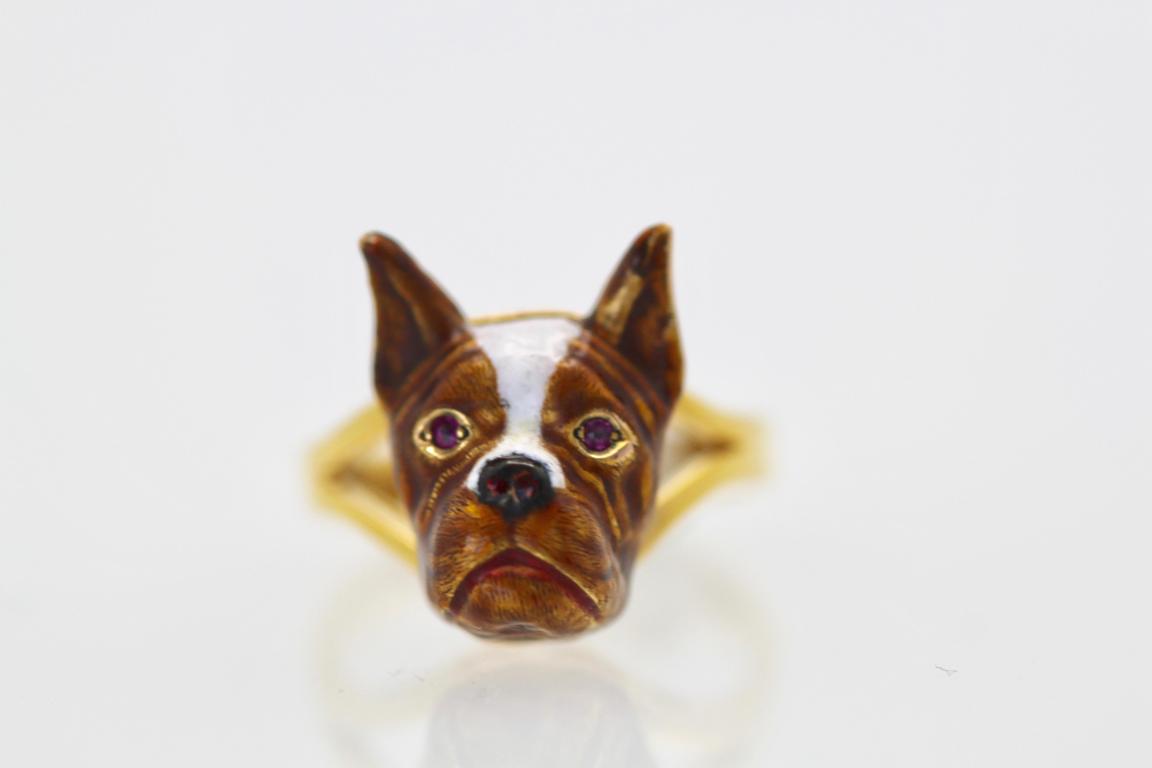 This enamel French Bulldog Ring is very realistic.  This bulldog has Ruby eyes and a black nose set in a nice yellow gold setting.  This ring measures 15mm x 12mm weighs 5.2 grams of gold and is set in 18K yellow Gold.  Sweet bulldog for Frenchie
