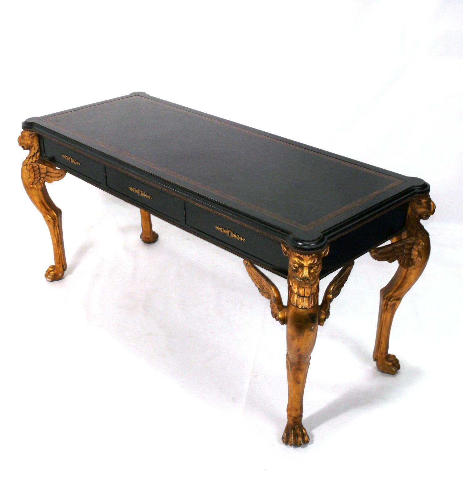 French Empire Style Bureau Plat or Desk, France, circa 1950s. Elegant design in black lacquered wood with brass hardware and an inset black leather top. It is finished on both sides, so it could be floated in a room, see last photo of the back side.