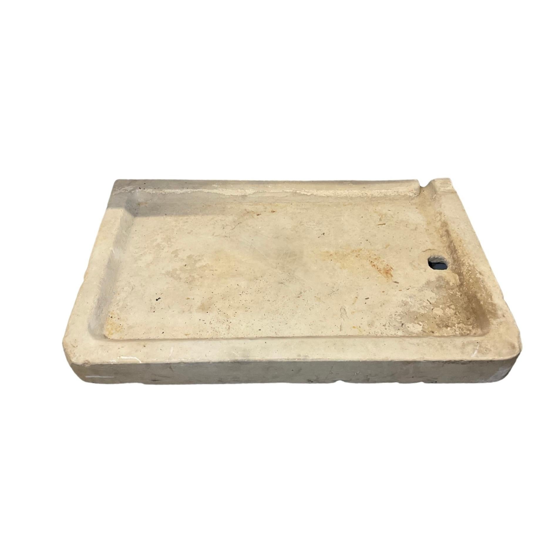 This French Burgundy Limestone Sink features a tough shape style inspired by 18th century designs. Durable, elegant, and stylish, this sink is a perfect addition to any modern bathroom.