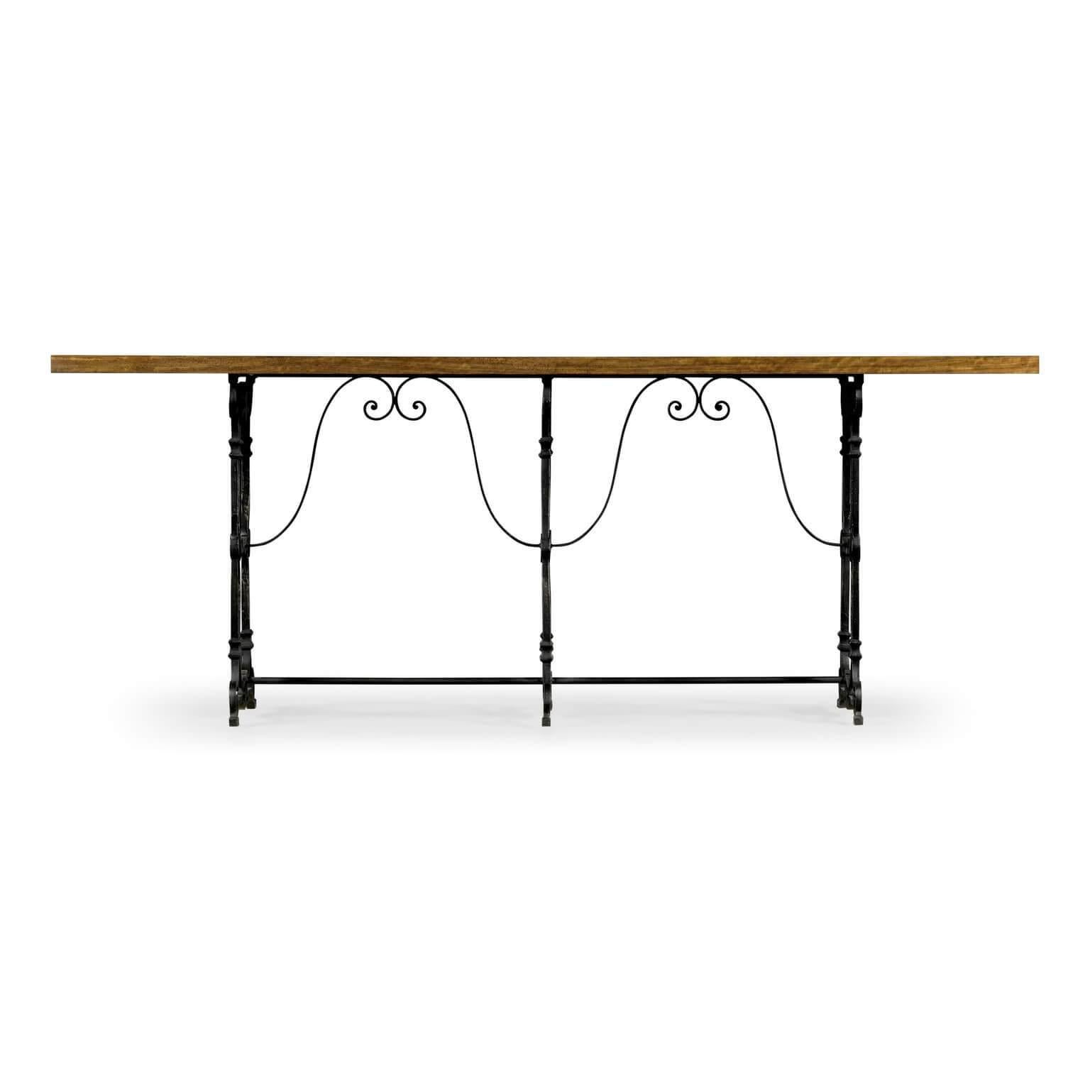 French Caledonia burl wood and wrought iron console table.

Dimensions: 84