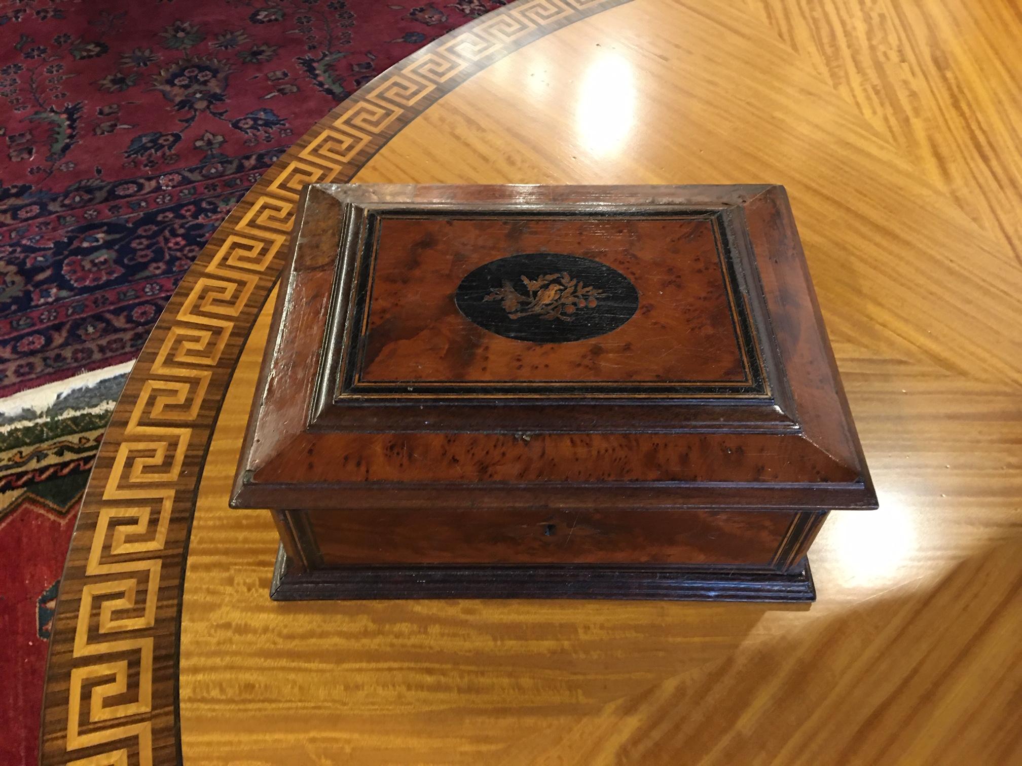 French burl walnut and inlay jewelry box, 19th century. Decorative inlay with a bird and flowers design.