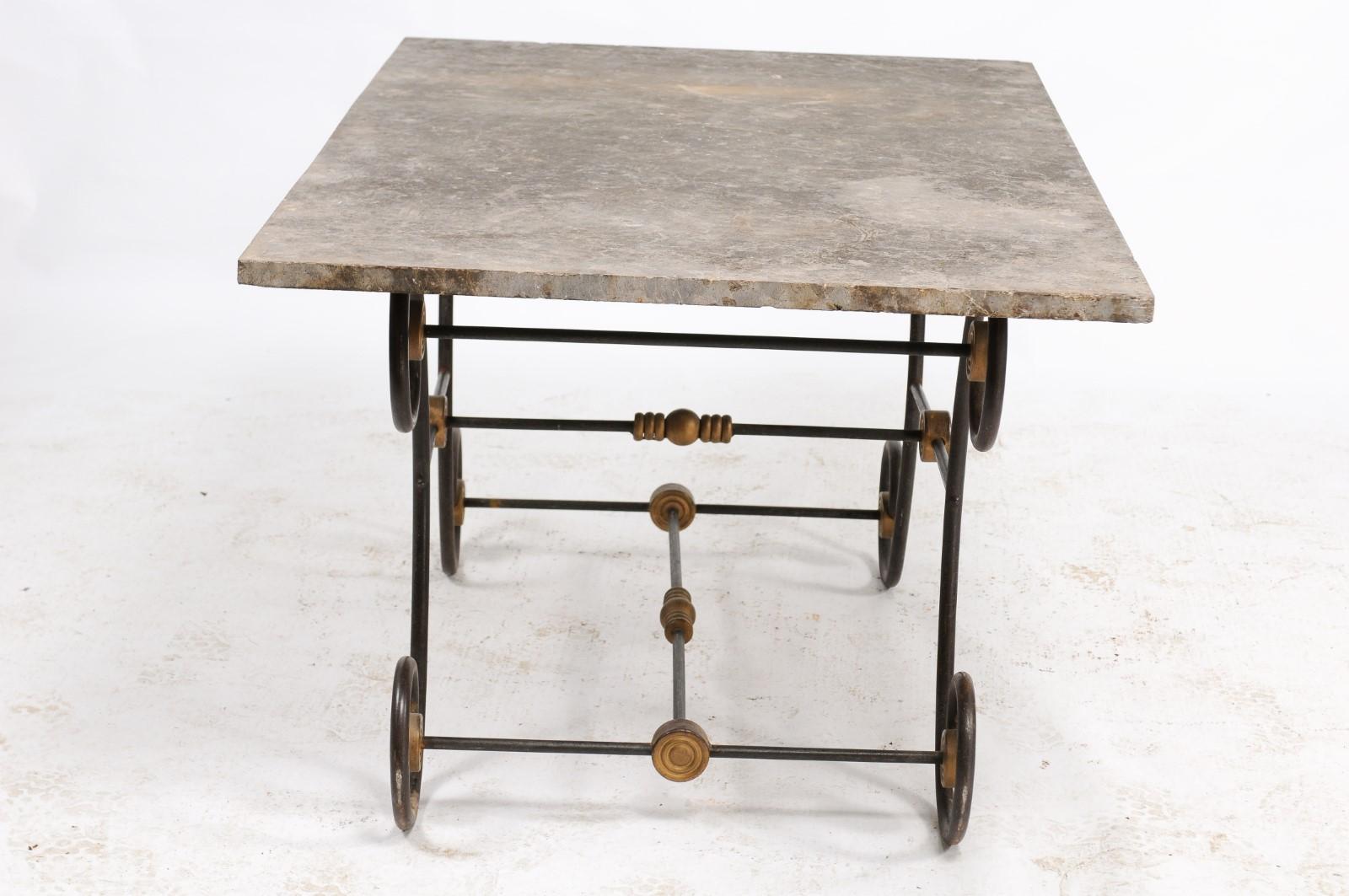 French Butcher Table with Scrolled Iron Base and Wooden Top, Late 19th Century In Good Condition For Sale In Atlanta, GA