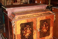 French cabinet from the first half of the 1800s, richly inlaid in the Louis XV
