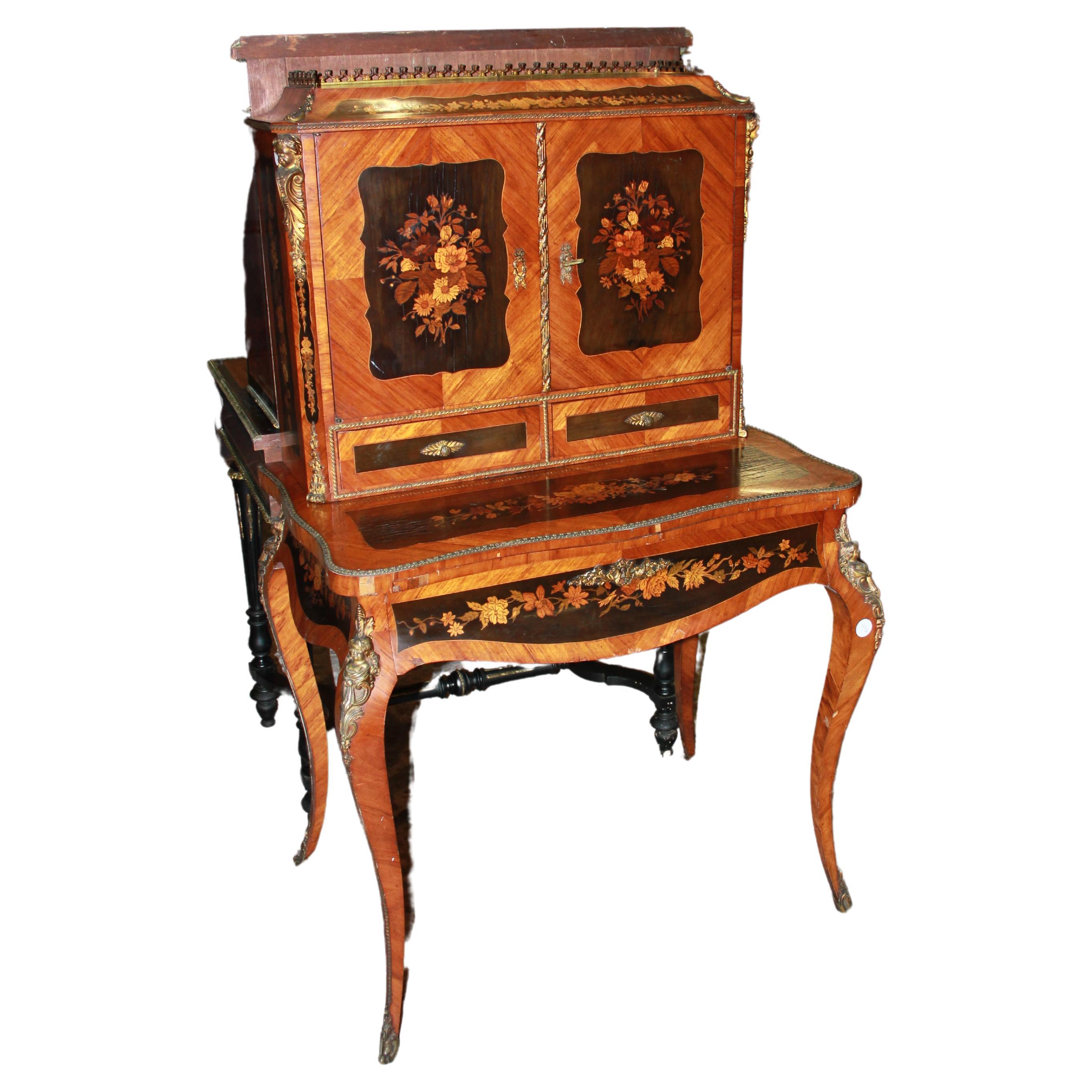 French cabinet from the first half of the 1800s, richly inlaid in the Louis XV  For Sale