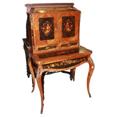 French cabinet from the first half of the 1800s, richly inlaid in the Louis XV 