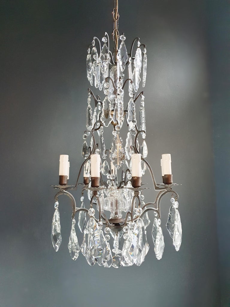 old chandelier with love and professionally restored in Berlin. electrical wiring works in the US.
Re-wired and ready to hang
not one missing
Cabling completely renewed. Crystal, hand-knotted.
Measures: Total height 110 cm, height without chain 80